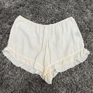 Calvin Rucker Ruffle Hem Shorts in Cream, Size L